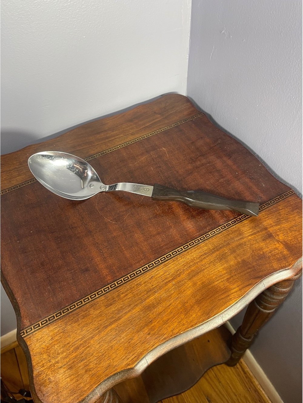 Cutco Vintage Stainless Steel Serving Spoon with Black Handle